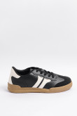 Tenis negros casuales con suela plana y contrastes blancos