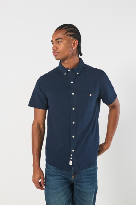 Camisa unicolor en algodón con cuello button down