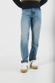 Jean 90´S tiro bajo azul claro con desgastes y cremallera