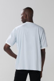 Camiseta azul clara oversize college con manga corta