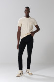 Jean skinny ceñido con bolsillos y tiro bajo negro