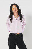Blusa unicolor manga larga amplia con abertura en espalda