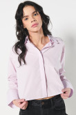 Blusa unicolor manga larga amplia con abertura en espalda