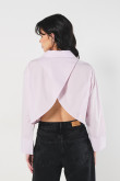 Blusa unicolor manga larga amplia con abertura en espalda
