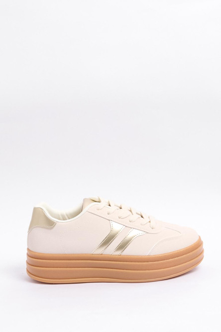 Tenis casuales unicolores con suelas altas y contrastes