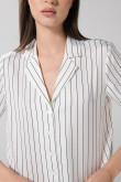 Blusa unicolor manga corta a rayas con botones