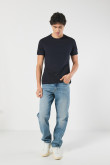 Jean 90´S azul claro con bota recta, desgastes y tiro bajo