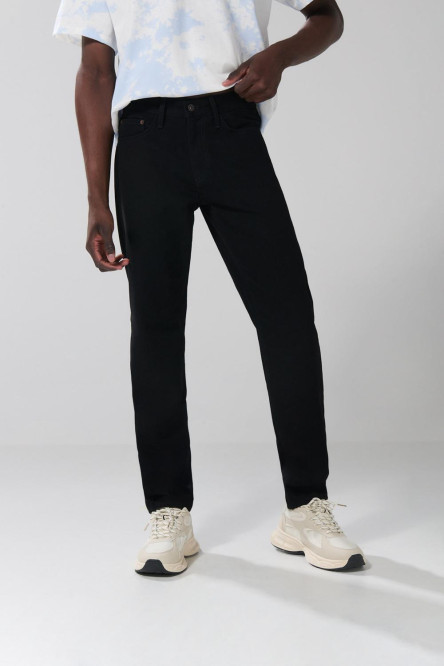 Jean negro 90´S con bolsillos, tiro bajo y bota recta