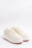 Tenis casuales cremas con suelas altas y cordones
