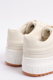 Tenis casuales cremas con suelas altas y cordones