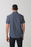 Camisa unicolor a rayas manga corta con botones