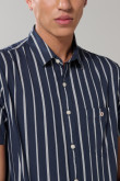 Camisa unicolor a rayas manga corta con botones