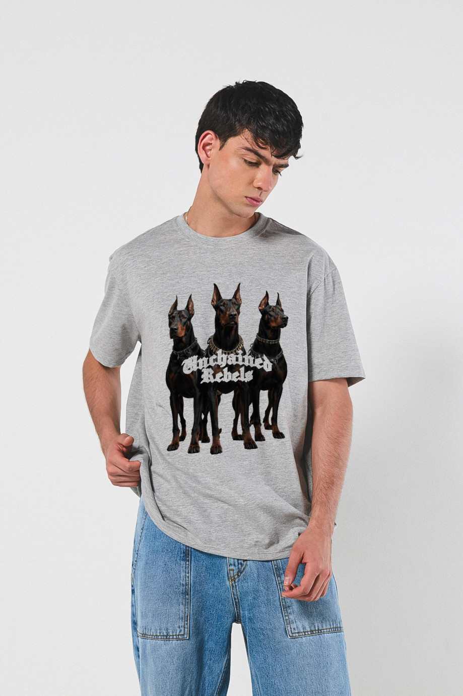 Camiseta oversize manga corta unicolor con diseño de perros