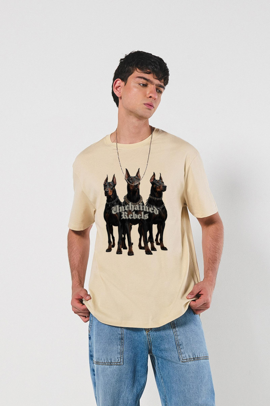 Camiseta oversize manga corta unicolor con diseño de perros