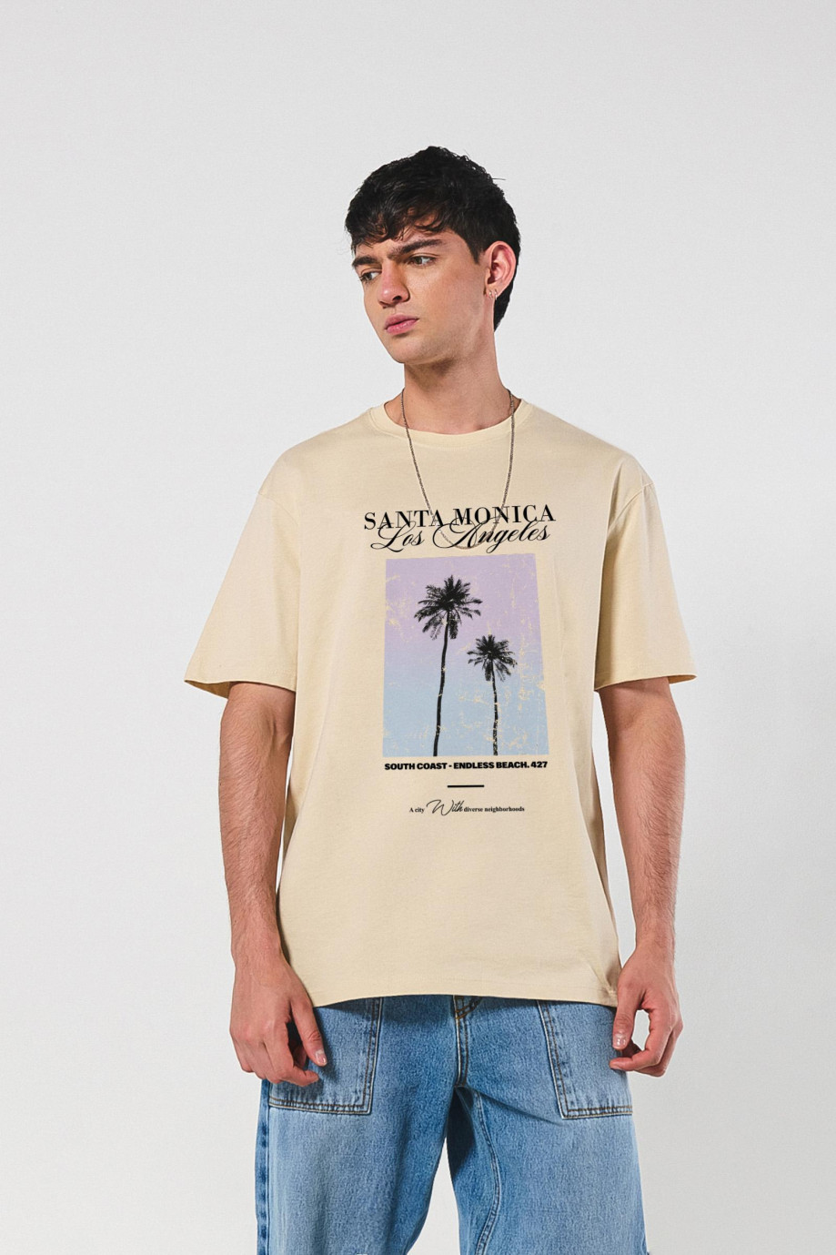 Camiseta unicolor oversize manga corta con diseño de playa