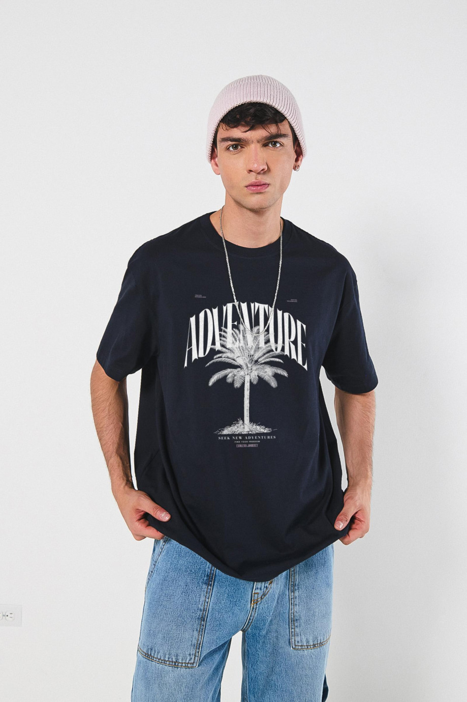 Camiseta cuello redondo oversize unicolor con arte de playa
