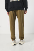 Pantalón jogger unicolor con elástico en bota y bolsillos
