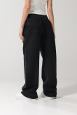 Jean tiro medio baggy gris intenso con bota ancha