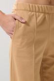 Pantalón jogger unicolor con bota recta y bolsillos