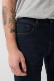 Jean tiro bajo slim azul intenso ajustado con bolsillos