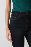 Jean tiro alto jegging ceñido azul intenso con bolsillos