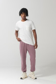 Pantalón unicolor jogger con elástico en bota y bolsillos