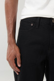 Jean 90´S tiro bajo con bota recta negro y bolsillos