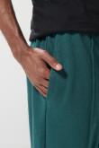 Pantalón jogger unicolor con bolsillos y bota recta
