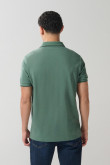 Camiseta unicolor tipo polo manga corta con botones