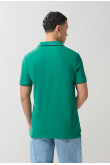 Camiseta unicolor tipo polo con aberturas y manga corta