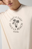 Camiseta unicolor cuello redondo con arte college de playa