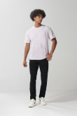 Jean negro tipo skinny ceñido con tiro bajo y cremallera