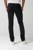 Jean negro tipo skinny ceñido con tiro bajo y cremallera
