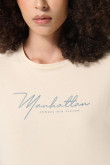 Camiseta unicolor crop top con arte college delantero