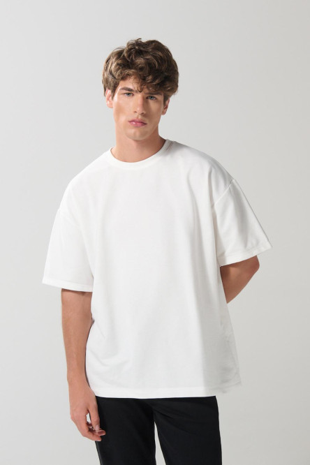 Camiseta en fleece grueso unicolor oversize manga corta
