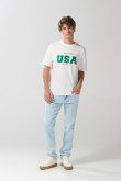Camiseta manga corta crema con arte college verde