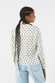 Blusa crema clara manga larga con puntos negros estampados