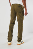 Pantalón unicolor slim en dril con bolsillos y tiro medio