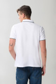 Camiseta unicolor polo con manga corta y aberturas