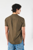Camisa verde oscura cuello nerú con diseños de puntos