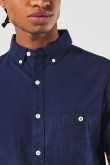 Camisa cuello button down unicolor con manga corta