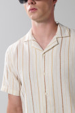 Camisa unicolor a rayas con botones y manga corta