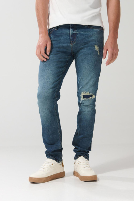 Jean azul oscuro slim con tiro bajo, rotos y parche interno