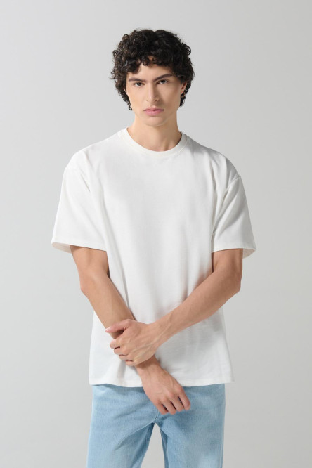 Camiseta unicolor oversize en tela pesada manga corta