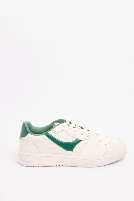 Tenis unicolores casuales con contrastes localizados