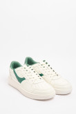 Tenis unicolores casuales con contrastes localizados