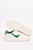 Tenis unicolores casuales con contrastes localizados