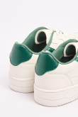 Tenis unicolores casuales con contrastes localizados