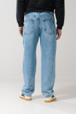 Jean baggy tiro medio azul con bota ancha y bolsillos