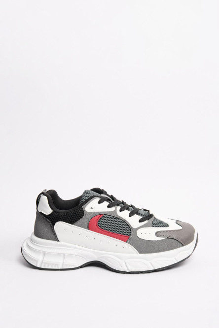 Tenis de plataforma grises con detalle en malla y contrastes